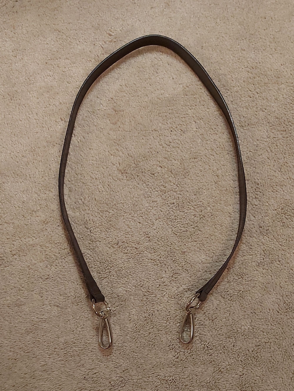 Dark brown horsebit bag strap